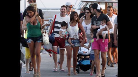 Messi and Roccuzzo are pictured on holiday in Ibiza with Cesc Fabregas and his girlfriend Daniella Semaan, who are expected to attend the wedding.