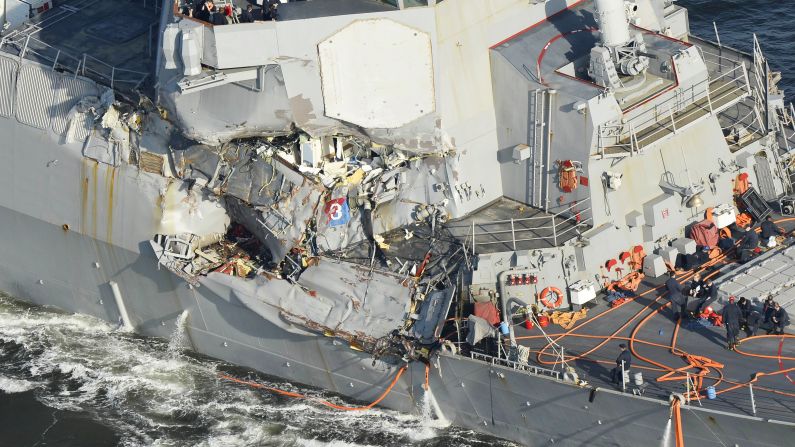 A Kyodo News helicopter shows the damaged part of the U.S. Navy's guided-missile destroyer, the USS Fitzgerald, which collided with a Filipino container vessel off Yokosuka, south of Tokyo. The accident has left seven crew members of the destroyer unaccounted for and three injured. 