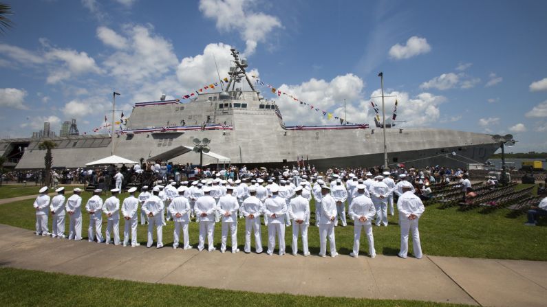 The crew of the USS Gabrielle Giffords stands at the ready prior to the commissioning ceremony on Saturday, June 10, in Galveston, Texas. The U.S. Navy commissioned the warship, which is named for former Rep. Gabrielle Giffords (D-AZ.), a gun violence survivor. It's the third Navy ship ever to be named after a living woman. 