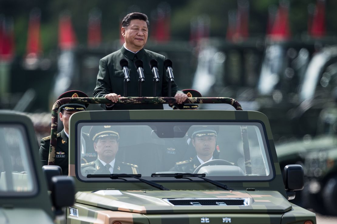 China's President Xi Jinping inspects People's Liberation Army soldiers at a barracks in Hong Kong on June 30.