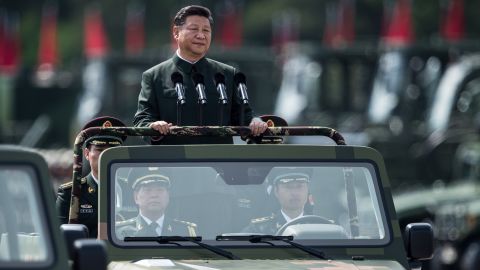 China's President Xi Jinping inspects People's Liberation Army soldiers at a barracks in Hong Kong on June 30.