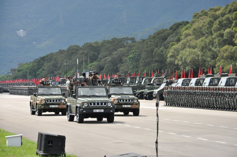 The parade was the largest since Hong Kong's handover from British to Chinese rule in 1997. 