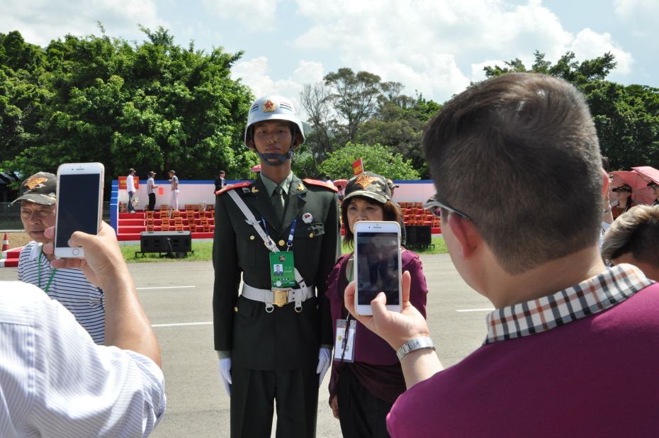 A small crowd of onlookers were specially invited to the parade alongside Xi. 