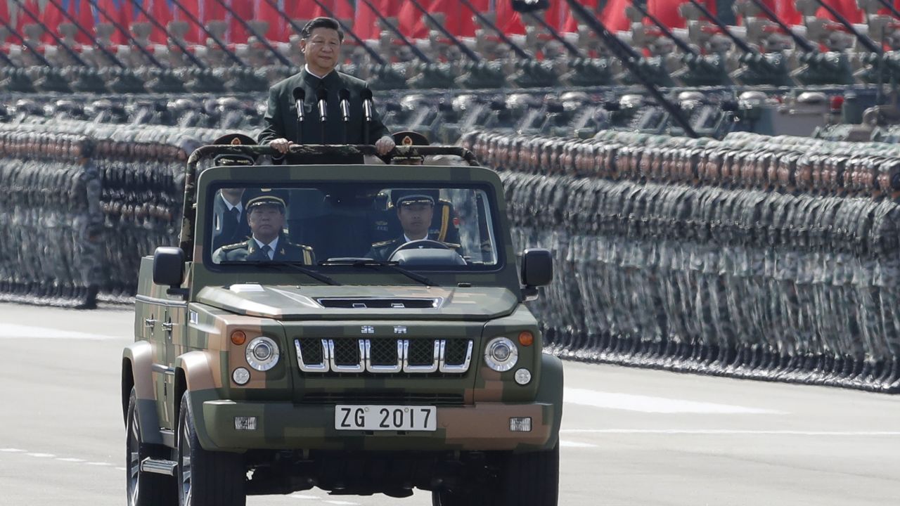 Chinese President Xi Jinping inspects the People's Liberation Army of the Hong Kong Garrison at the Shek Kong Barracks in Hong Kong, Friday, June 30, 2017. Xi landed in Hong Kong Thursday to mark the 20th anniversary of Beijing taking control of the former British colony, accompanied by a formidable layer of security as authorities showed little patience for pro-democracy protests. (AP Photo/Kin Cheung)