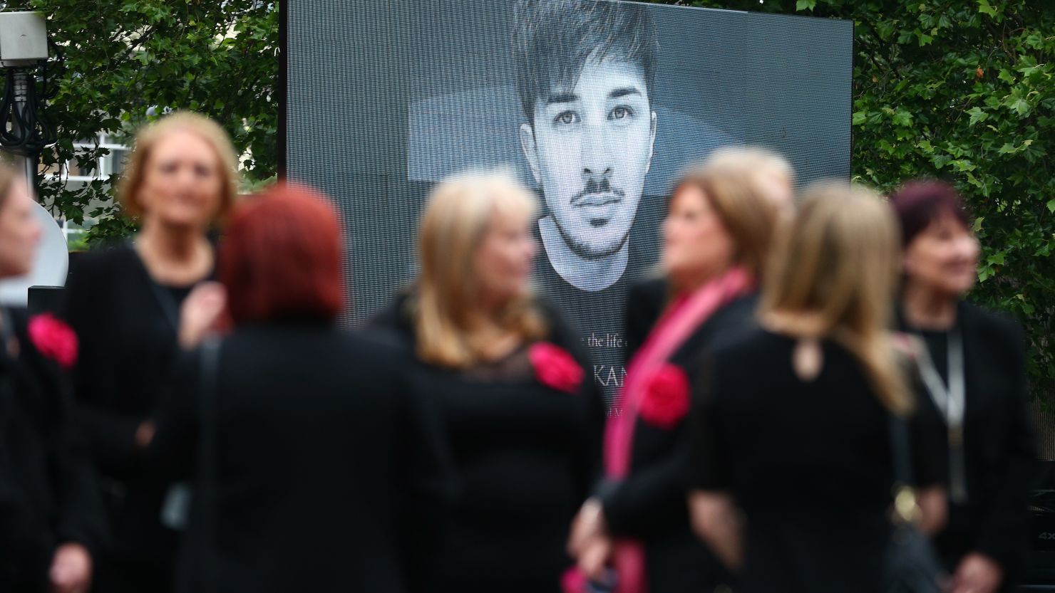 Martyn Hett's funeral service was relayed on large screens at Stockport Town Hall for the crowd outside.