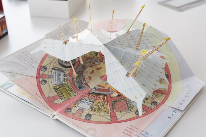 This cardboard model represents London's Millennium Dome. Opened on January 1, 2000, the Dome was slammed for its spiraling costs and unoriginal museum exhibitions. Considered an <a href="http://news.bbc.co.uk/2/hi/uk_news/politics/650948.stm" target="_blank" target="_blank">embarrassment</a> for Tony Blair's government, the building was subsequently sold into private hands.