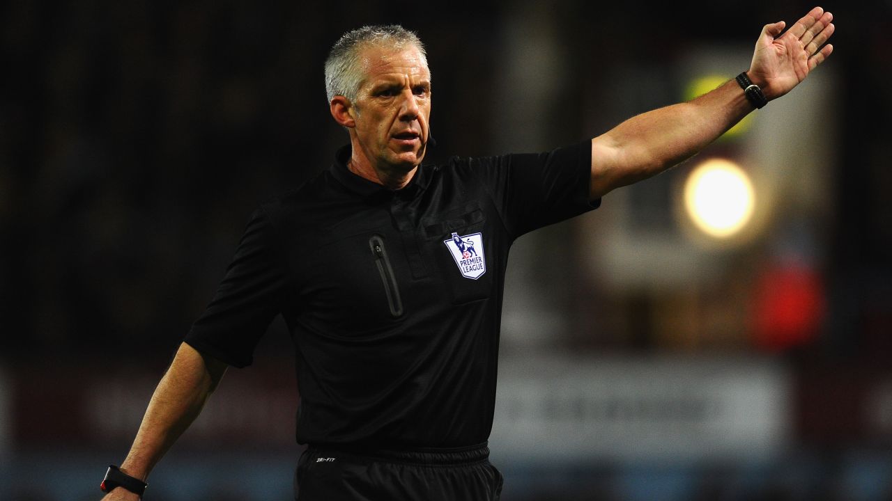 LONDON, ENGLAND - NOVEMBER 23:  Referee Chris Foy in action during the Barclays Premier League match between West Ham United and Chelsea at Boleyn Ground on November 23, 2013 in London, England.  (Photo by Mike Hewitt/Getty Images)