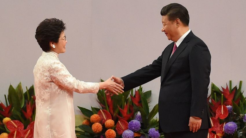 Hong Kong's new Chief Executive Carrie Lam (L) shakes hands with China's President Xi Jinping (R) after being sworn in as the territory's new leader at the Hong Kong Convention and Exhibition Centre in Hong Kong on July 1, 2017.
Lam became Hong Kong's new leader on July 1, which marks the culmination of the lifelong civil servant's career as she inherits a divided city fearful of China's encroaching influence.  / AFP PHOTO / Anthony WALLACE        (Photo credit should read ANTHONY WALLACE/AFP/Getty Images)