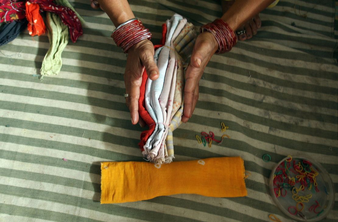 NGOs and aid workers help women make clean and cheap sanitary napkins.
