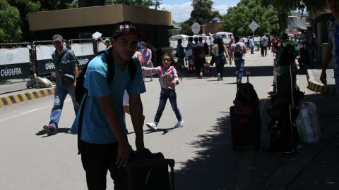 Victor Martinez, who is out of school due to protests, makes the cross-border journey to buy supplies for his family.