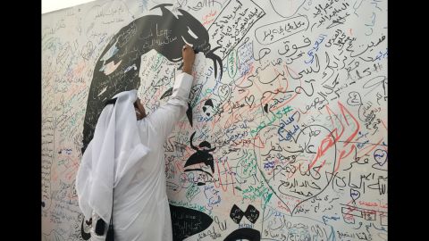 A man writes a message of support to the Emir amid the growing crisis between the Gulf kingdom and its neighbors.