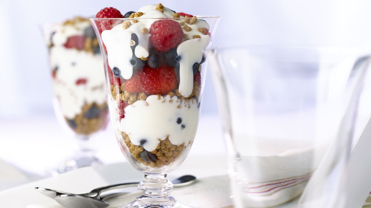 Mix Greek yogurt with berries, whole-grain granola and some nuts. Before you know it, you've added a couple of grams of fiber and had a great low-cal dessert.