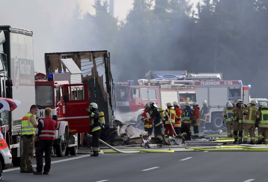 Fire fighters and emergency services can be seen at the motorway A9 near Münchberg, Germany.