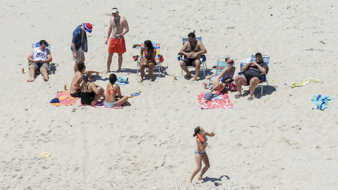 New Jersey Gov. Chris Christie uses the beach with his family and friends at the governor's summer house at Island Beach State Park in New Jersey on July 2.