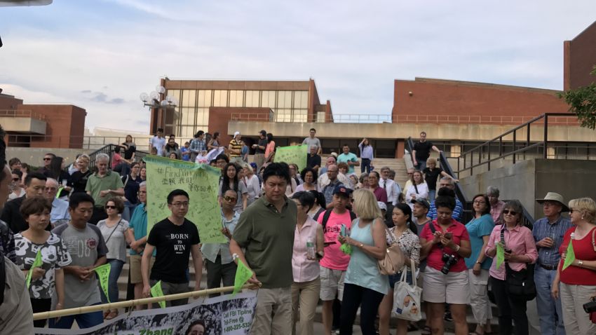 Brendt Christensen, who has been accused of kidnapping University of Illinois graduate student, Yingying Zhang, can be seen in the black t-shirt in the upper right side of this photo attending a rally for Zhang on July 29 on the Champaign--Urbana, Illinois campus.