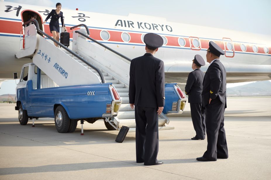 A new book called "Dear Sky" by photographer Arthur Mebiu looks at the people and planes of Air Koryo, North Korea's state-owned national airline. Mebius shared a few photos from the book with CNN, including this image of crew disembarking after a Tupolev-134 flight.