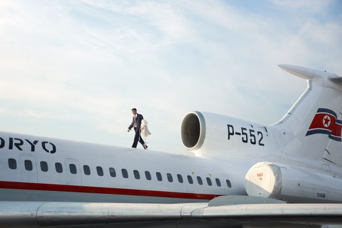 A pilot removes the engine covers of a Tupolev-154 before flight. Mebius says he's yet to receive any feedback from North Korea officials, but the book is "not intended to be negative in any way."