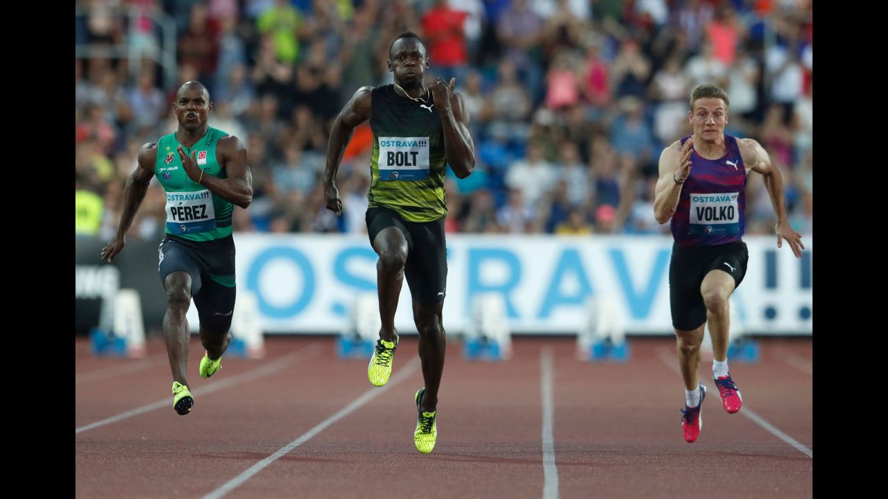Jamaican sprinter Usain Bolt, the world's fastest man, is flanked by Cuba's Yunier Perez and Slovakia's Jan Volko during a 100-meter race Wednesday, June 28, in Ostrava, Czech Republic. Bolt won the race, holding off Perez by 0.03 seconds.