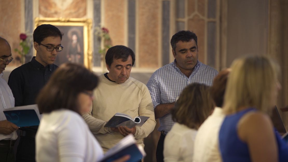 Miguel Alves and his wife, Fatima, sing in the choir of their Portuguese community church.