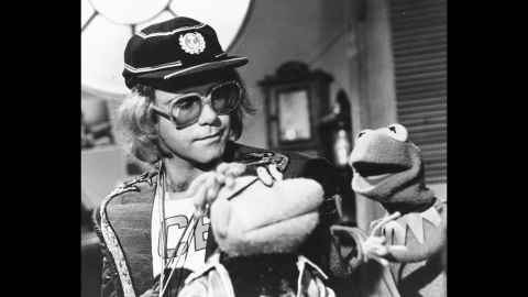 John appears on "The Muppet Show" in 1978. He performed four of his songs on the episode.