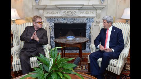 John meets with US Secretary of State John Kerry in 2014. The two talked about John's foundation as well as PEPFAR, the President's Emergency Plan for AIDS Relief.
