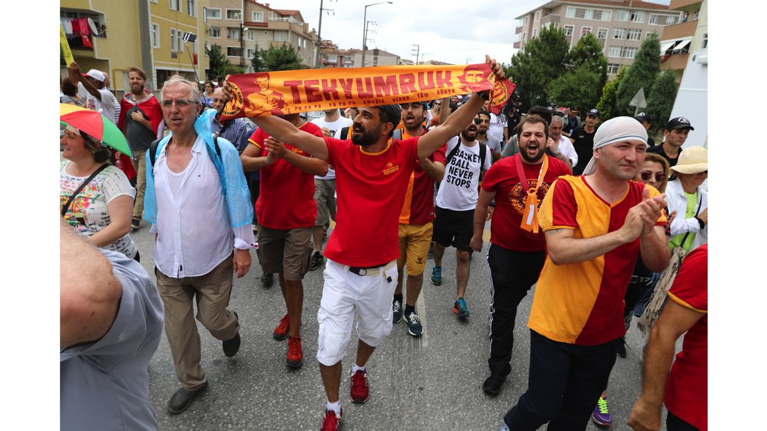 Football fans from the Galatasaray football team joined in the march, adding their stadium chants and songs. 
