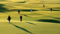 ST ANDREWS, SCOTLAND - SEPTEMBER 29:  Amateur players finishing their round on the 18th hole during the first practise round of the 2015 Alfred Dunhill Links Championship at The Old Course on September 29, 2015 in St Andrews, Scotland.  (Photo by David Cannon/Getty Images)
