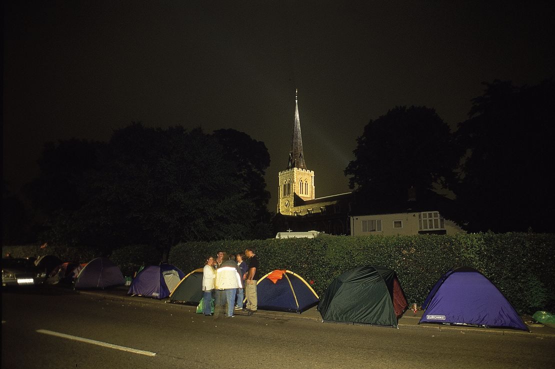 Fans queuing on the Church Road in 2000.