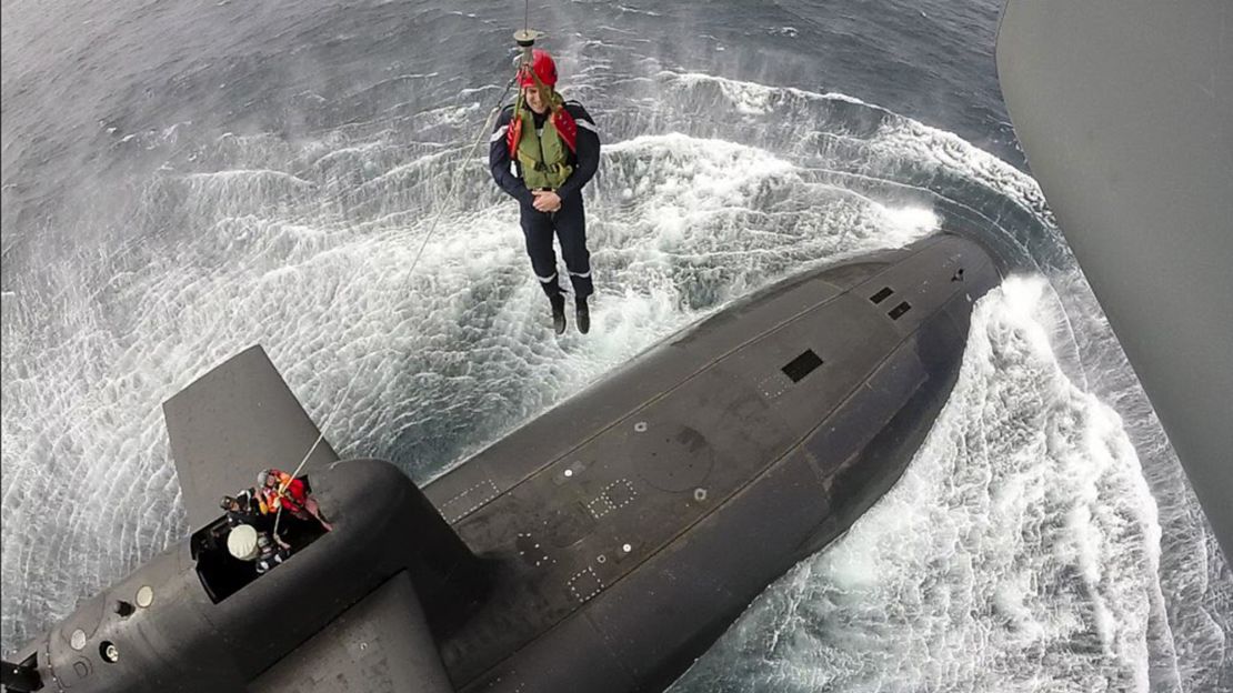 Emmanuel Macron visits the submarine Le Terrible off the Brittany coast.