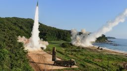EAST COAST, SOUTH KOREA - JULY 05:  In this handout photo released by the South Korean Defense Ministry, South Korea's Hyunmu-2 Missile System (L) and U.S. M270 Multiple Launch Rocket System (R) firing missiles during a U.S. and South Korea joint missile drill aimed to counter North Korea's intercontinental ballistic missile test on  July 5, 2017 in East Coast, South Korea. The U.S. Army and South Korean military responded to North Korea's missile launch with a combined ballistic missile exercise on Wednesday, into South Korean waters along the country's eastern coastline.  (Photo by South Korean Defense Ministry via Getty Images)