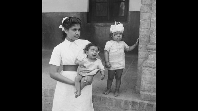 A nurse with two children who were rescued and taken to a hospital during communal unrest in Amritsar, Punjab, north India, in March 1947.