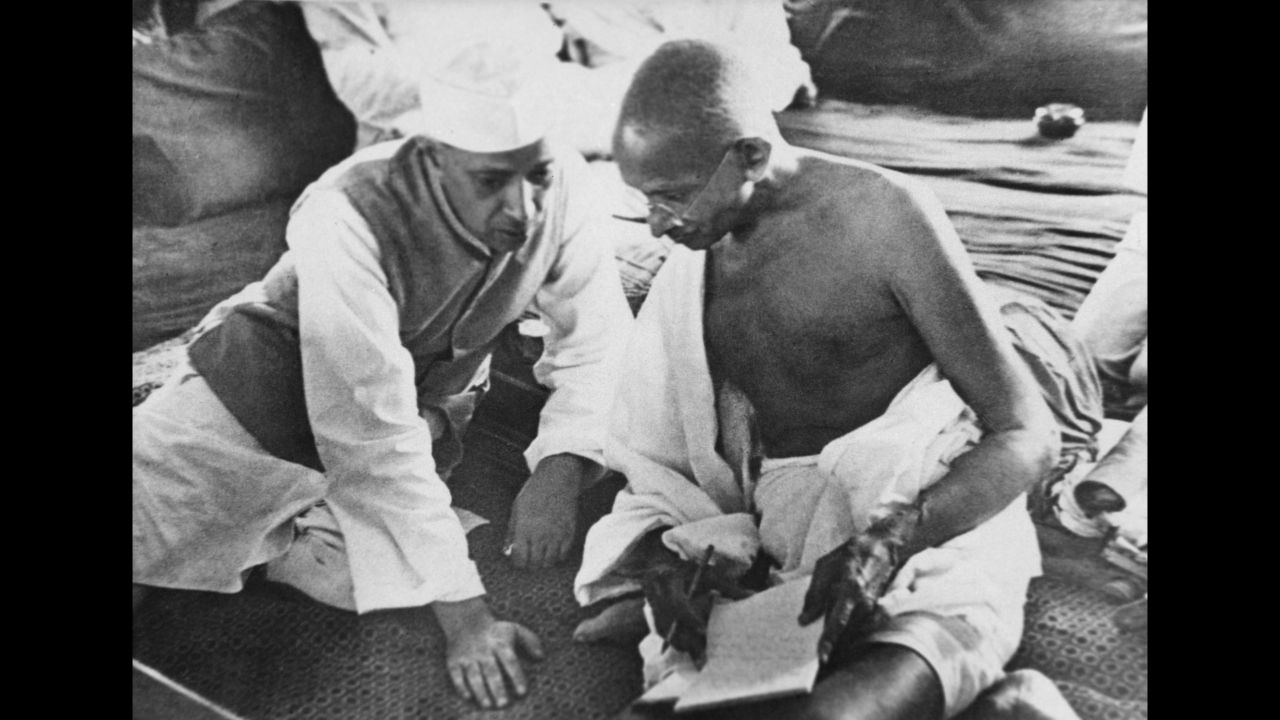 Jawaharlal Nehru (left) and Mahatma Gandhi (right) deep in conversation in Bombay, now Mumbai, India, in August 1942.<br /><br />India had been under the rule of the British since 1858, but had been agitating for self-governance for years. The country finally gained independence in August 1947. Nehru was a prominent Indian politician who became independent India's first prime minister. Nehru was a close friend of Gandhi, whose non-violent movement was fundamental to India's attainment of independence.