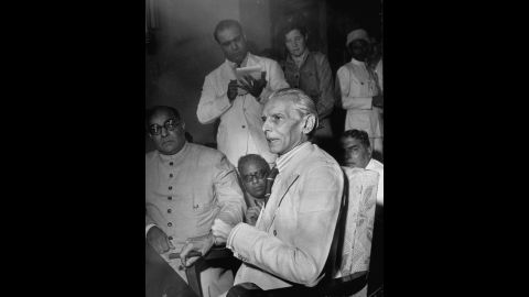 Leader of the Muslim League, Muhammad Ali Jinnah (center), holds a press conference in Mumbai, India, in July 1946. <br /><br />The Muslim League formed in 1906 to look after the interests of India's minority Muslim community. Jinnah demanded the creation of a separate Muslim nation called Pakistan by the time Britain handed over its power.