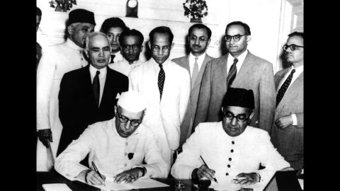 Nehru and Liaquat Ali Khan, Pakistan's first Prime Minister, sign an <a href=