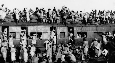 Hundreds of Muslim refugees crowd on top of a train leaving New Delhi for Pakistan in September 1947. </p><p>Partition led to millions being forced to migrate across the subcontinent. It's estimated that <a href=