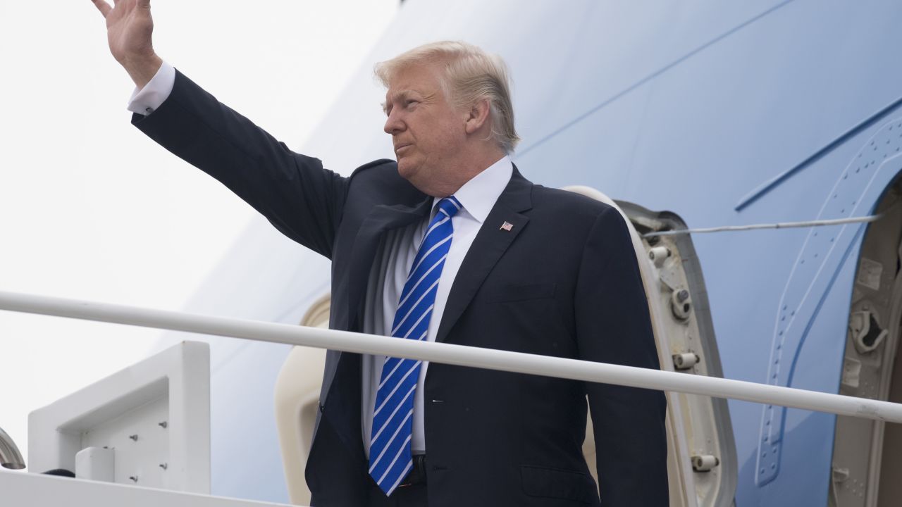 US President Donald Trump boards Air Force One prior to departure from Andrews Air Force Base in Maryland, July 5, 2017, as they travel on a 4-day trip to Poland and Germany. (SAUL LOEB/AFP/Getty Images)