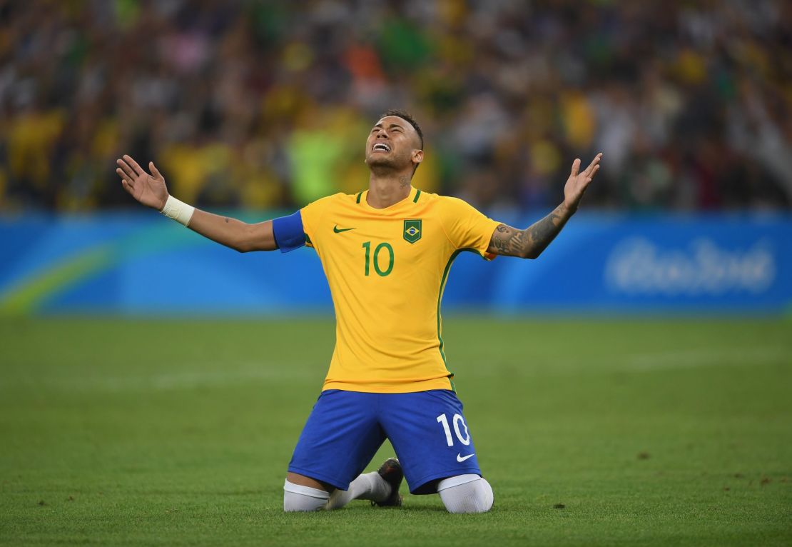 Neymar celebrates scoring the winning penalty in the penalty shoot out during the men's Olympic final between Brazil and Germany at the Maracana Stadium