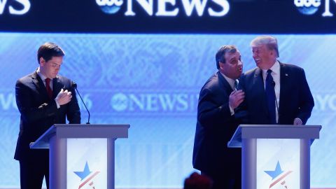 Christie visits with fellow presidential candidate Donald Trump during a commercial break of a Republican debate in February 2016. From the debate's outset, Christie pestered US Sen. Marco Rubio, left. His relentless attack against Rubio, who was surging in the polls, was one of <a href="http://www.cnn.com/2016/02/07/politics/republican-debate-takeaways/index.html" target="_blank">the memorable takeaways of the night. </a>