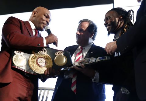 Boxing legend Mike Tyson presents Christie with a belt in April for the governor's work in helping former prisoners re-enter society.