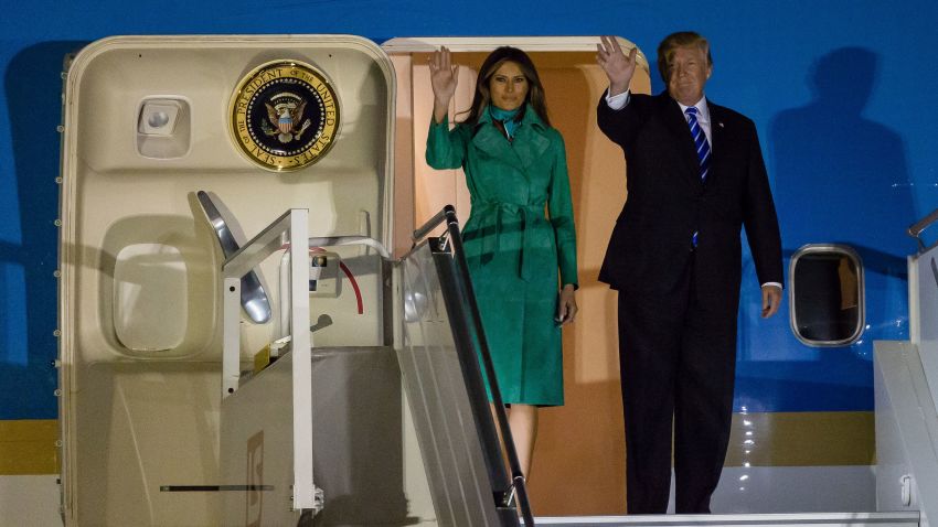 US President Donald Trump (R) and US First Lady Melania Trump (L) step off Air Force One upon their arrival at Chopin Airport in Warsaw,on July 5, 2017. Donald Trump arrived for high-stakes visit to Europe on July 5, landing in Poland ahead of his first G20 summit in Hamburg and a closely-watched meeting with Russian President Vladimir Putin. (WOJTEK RADWANSKI/AFP/Getty Images)