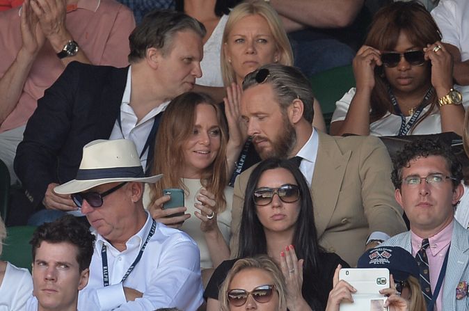 McCartney, seen here with her husband Alasdhair Willis at the 2014 Wimbledon championships enjoys playing tennis too. "I have a mean forehand, but a terrible, terrible backhand," she told CNN.  