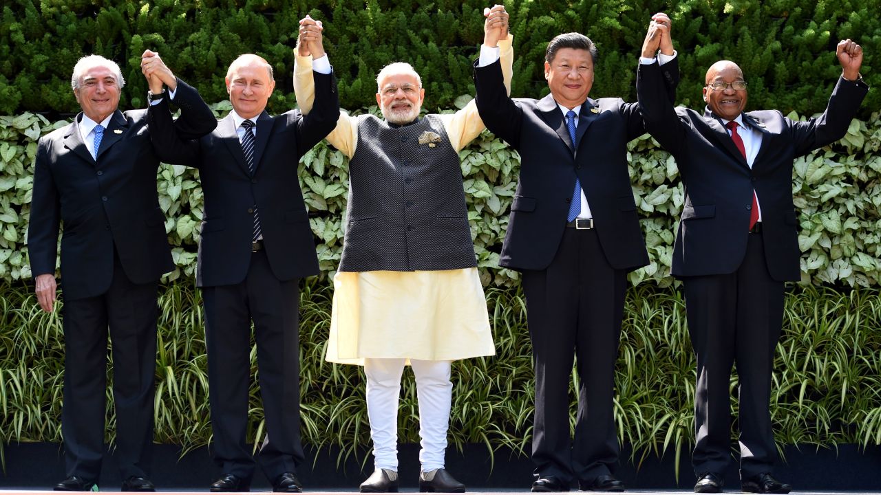 Brazilian President Michel Temer, Russian President Vladimir Putin, Indian Prime Minister Narendra Modi, Chinese President Xi Jinping and South African President Jacob Zuma pose for a group photo during the BRICS Summit in Goa.