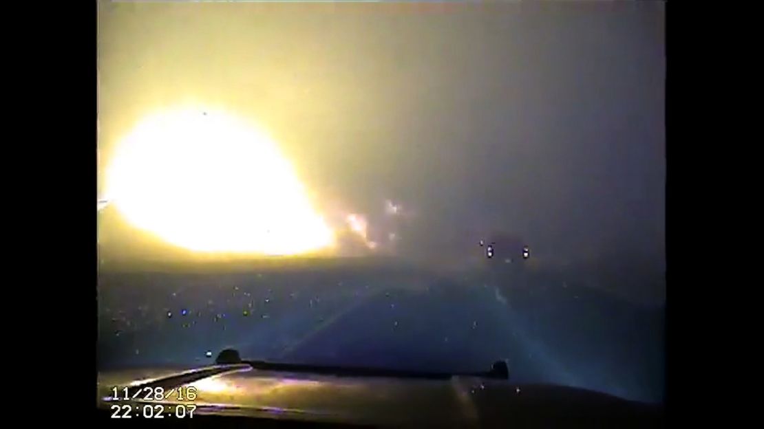Dashcam video from the Sevierville Police Department shows a fireball close to a road on November 28. 