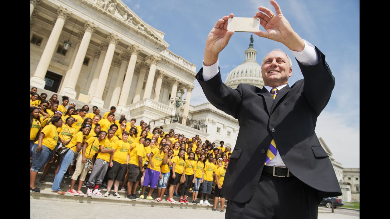 Scalise takes a selfie on the House steps in July 2014. Behind him are members of the Southeastern Louisiana Upward Bound program.