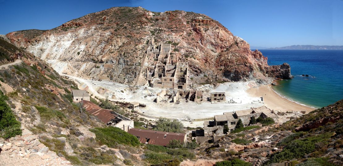 Paliorema is a golden sandy beach backed by an old abandoned mining town.