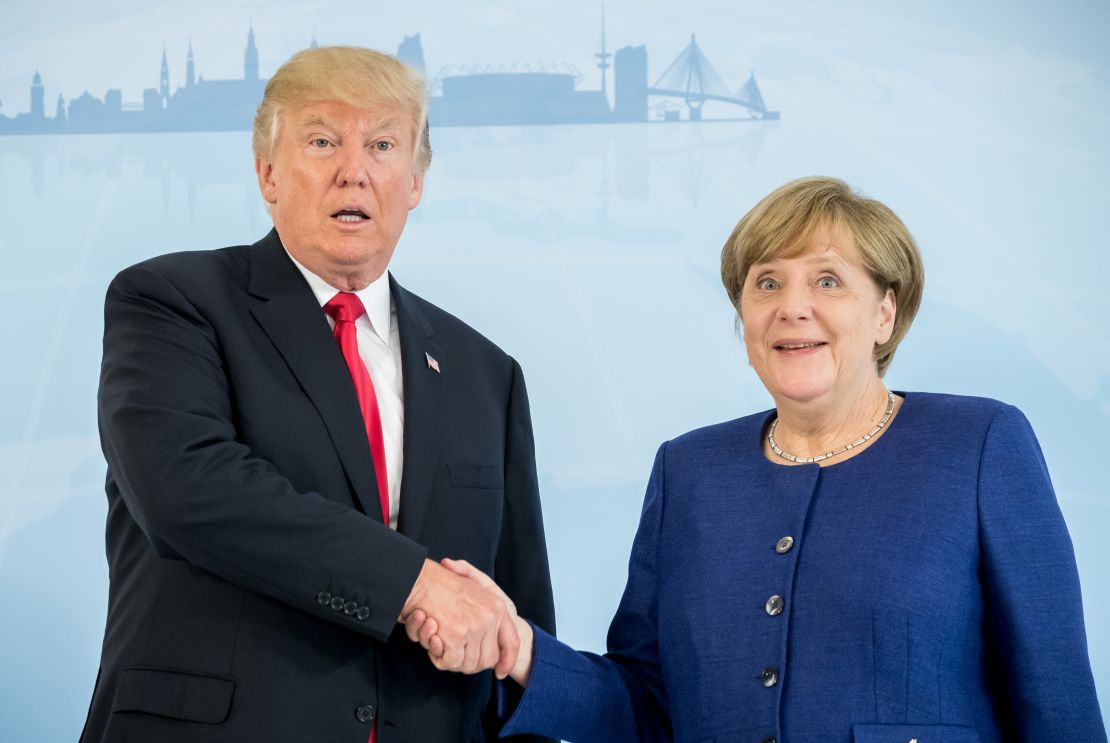 German Chancellor Angela Merkel and US President Donald Trump shake hands prior to a bilateral meeting on the eve of the G20 summit in Hamburg, northern Germany, on July 6, 2017.