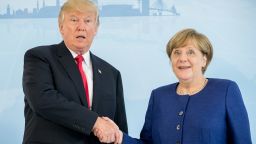German Chancellor Angela Merkel and US President Donald Trump  shake hands prior to a bilateral meeting on the eve of the G20 summit in Hamburg, northern Germany, on July 6, 2017.