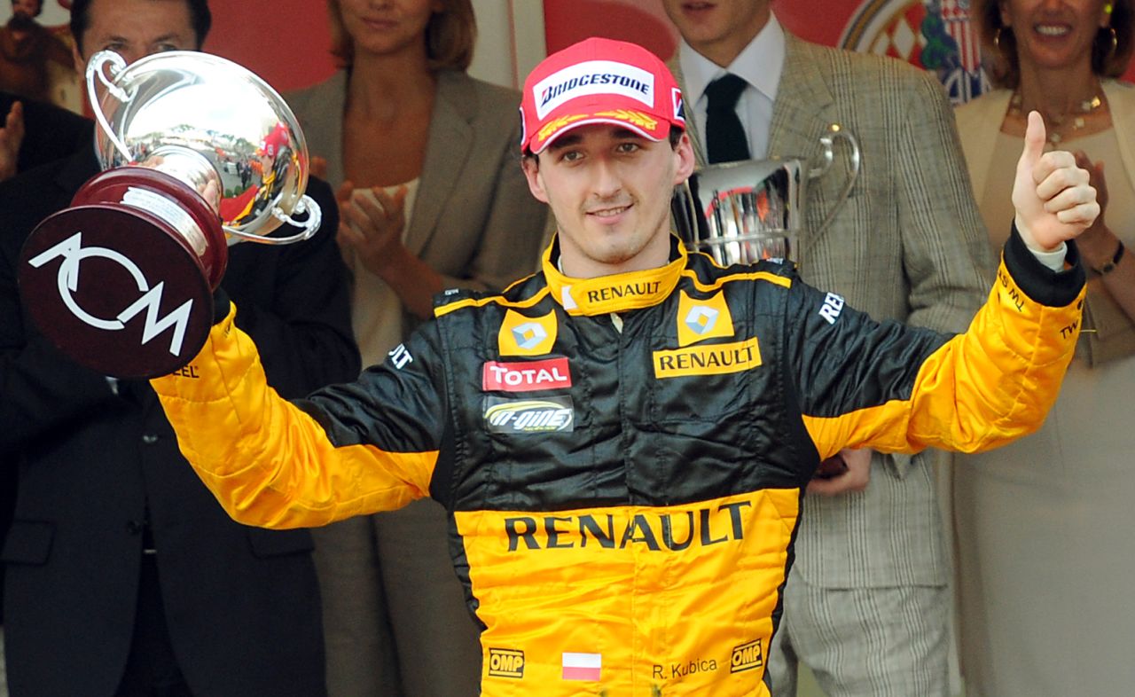 Kubica celebrates third place at the Monaco Grand Prix in 2010. "There is no side to him -- he was never political, he just got on with the racing," F1 journalist Maurice Hamilton told CNN. "I think people just warm to him for being a very humble modest guy with massive talent."