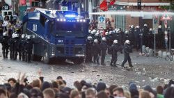 Riot police use water cannon during the "Welcome to Hell" rally against the G20 summit in Hamburg, northern Germany on July 6, 2017.