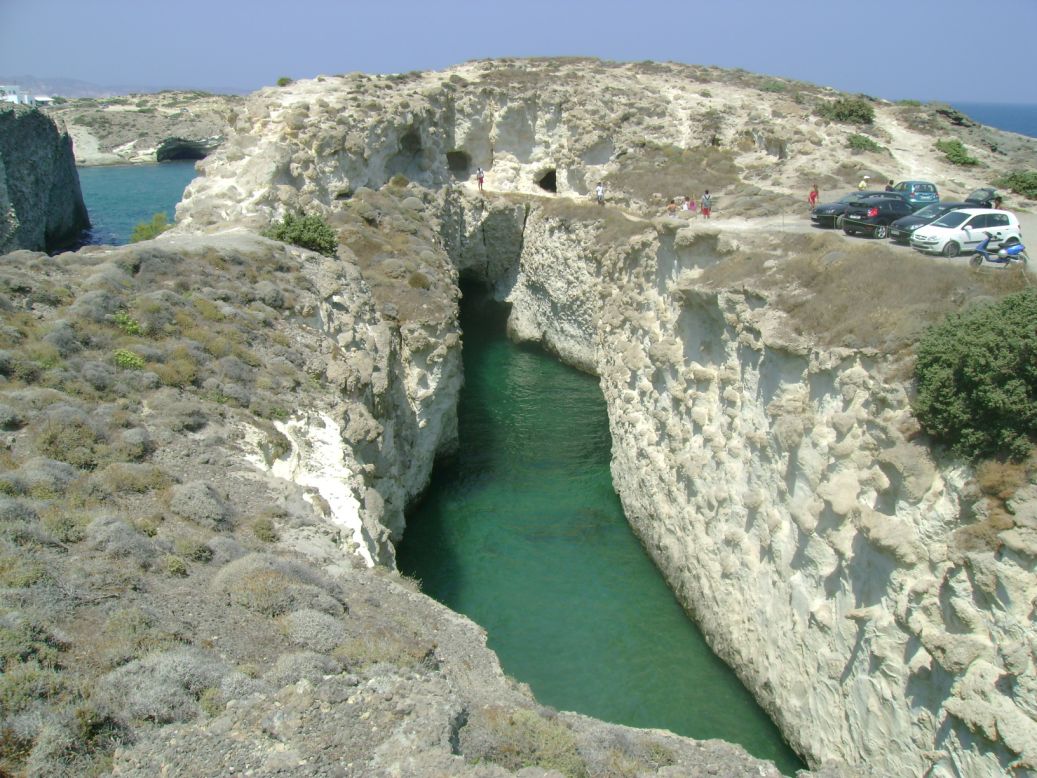 <strong>Papafragas: </strong>Caves, lagoons and dramatic rock formations over a sandy beach make Papafragas a popular spot on Milos' northeast coast.